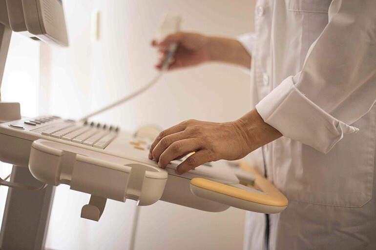 doctor preparing a scan included in primary care